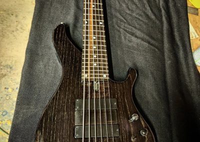 Muckelroy headless 31-inch 6-string bass - front