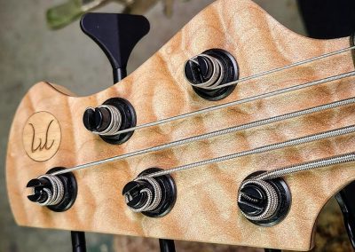 Muckelroy-Bass-5-string-Ensemble-Custom-Maple-Headstock